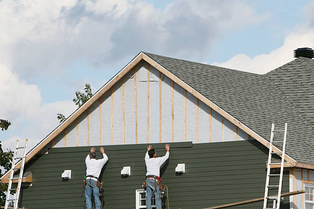 Professional Emergency Siding Repair technician working in Shawboro, NC